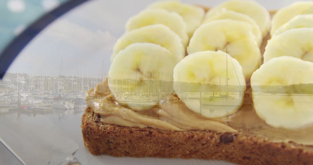 Rustic Breakfast Toast with Peanut Butter and Banana by Marina Window