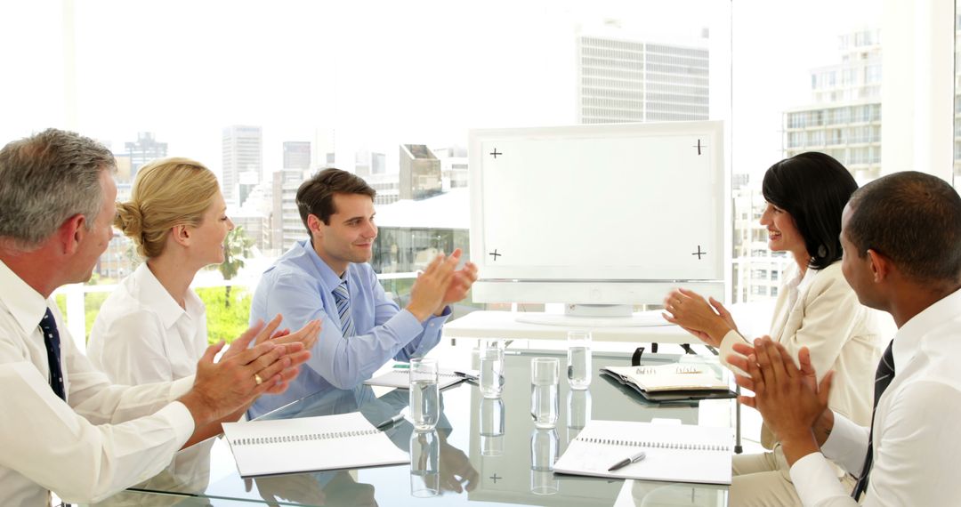 Business Team Applauding During Meeting in Modern Office - Free Images, Stock Photos and Pictures on Pikwizard.com