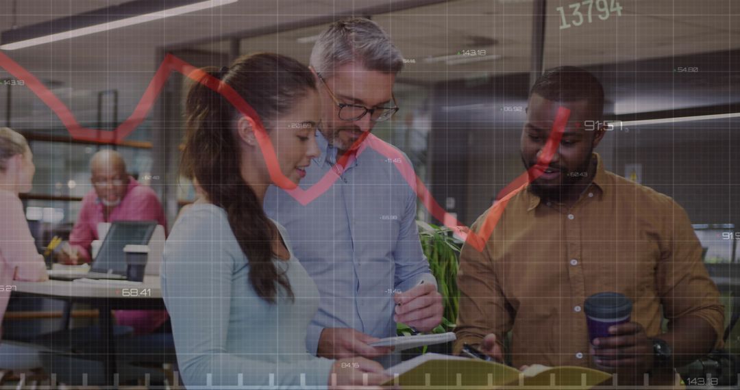 Diverse Executives Reviewing Financial Data in Modern Office