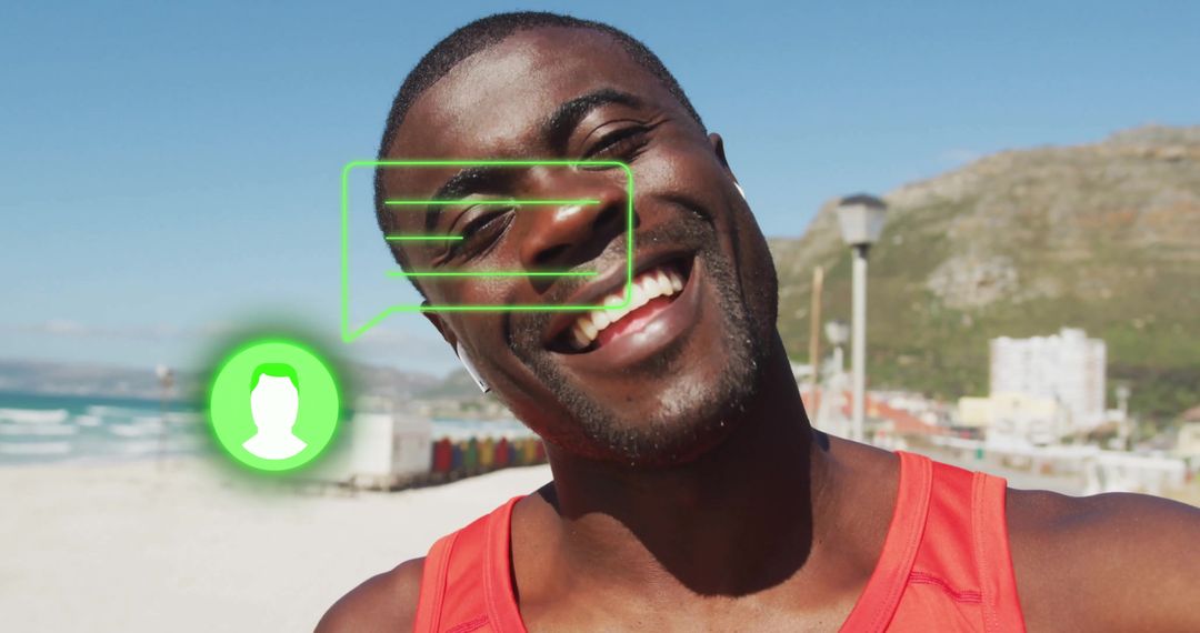 Cheerful Man with Digital Interface at Sunny Beach