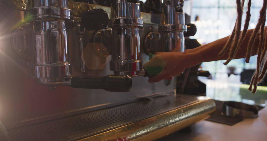 Barista Brewing Espresso with Professional Machine in Cozy Cafe