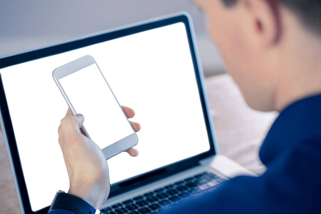 Transparent Smartphone and Laptop Focus in Professional Setting