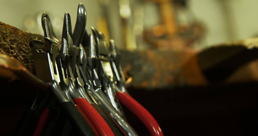 Assortment of Pliers Hanging on Rusted Metal Shelf in Workshop - Free Images, Stock Photos and Pictures on Pikwizard.com