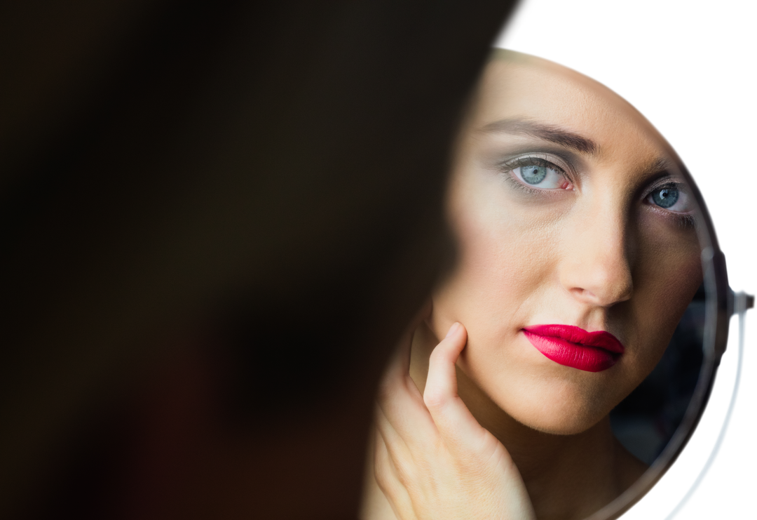 Attractive woman with makeup looking into mirrored reflection on transparent background - Download Free Stock Images Pikwizard.com