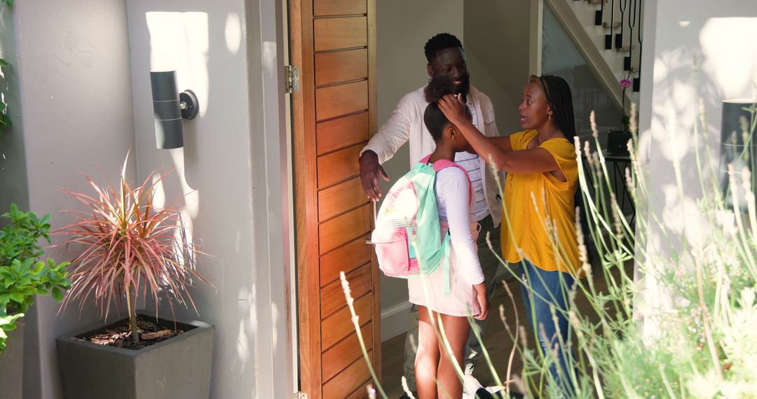 African American Family home with daughter preparing for school