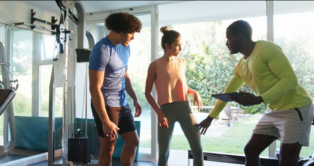 Diverse Friends Exercising Together Using Fitness Technology