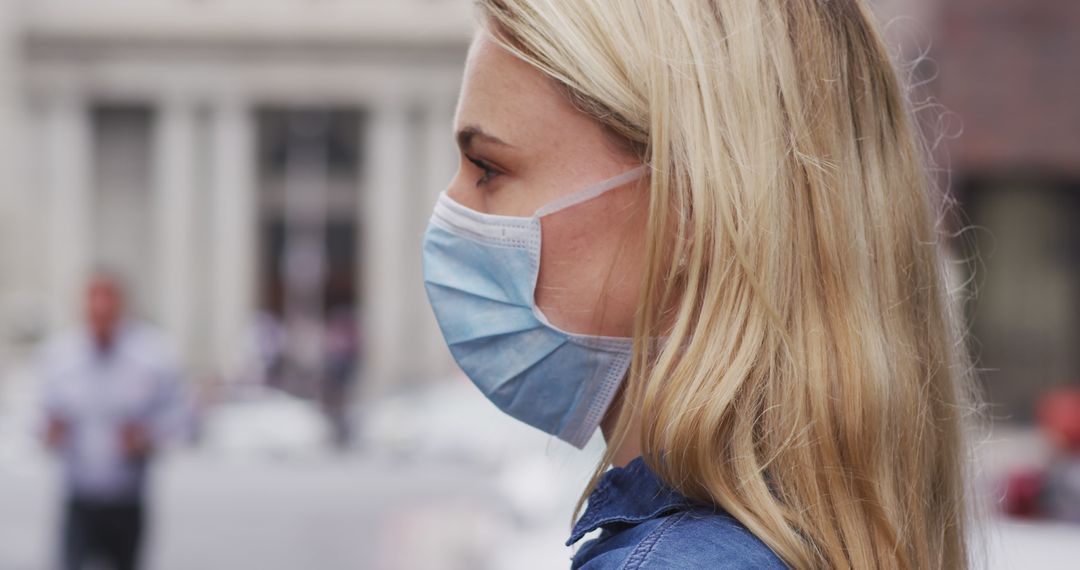 Woman Wearing Protective Face Mask in Urban Setting - Free Images, Stock Photos and Pictures on Pikwizard.com