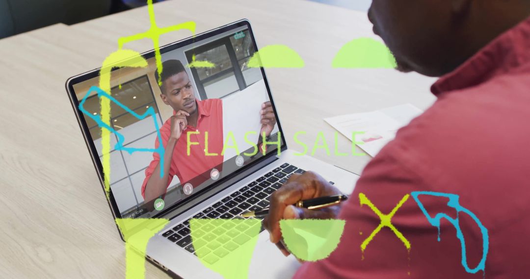 Senior Executive Taking Notes From Virtual Meeting