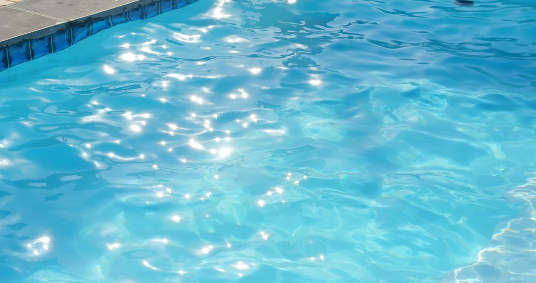 Close-up of Rippling Water in a Swimming Pool on a Sunny Day - Free Images, Stock Photos and Pictures on Pikwizard.com