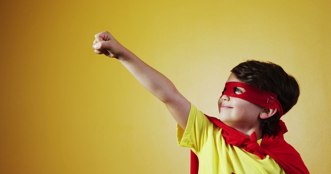 Boy pretending to be a superhero 4k - Free Images, Stock Photos and Pictures on Pikwizard.com