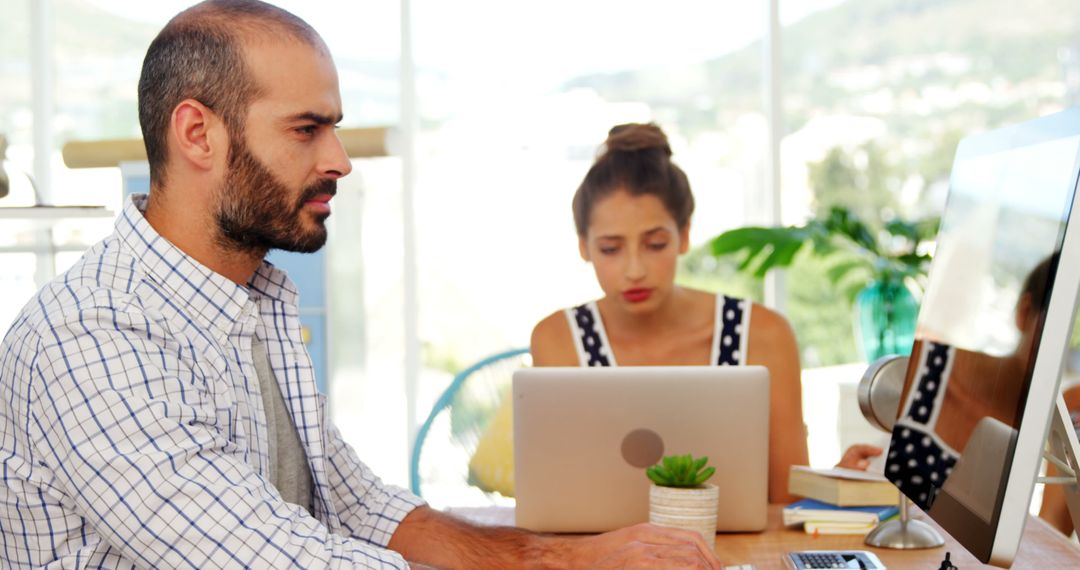 Professionals Collaborating in Bright Office Environment