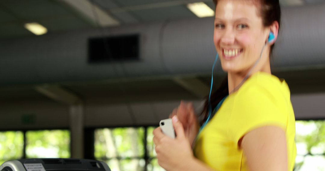 Woman Exercising on Treadmill in Modern Gym - Free Images, Stock Photos and Pictures on Pikwizard.com