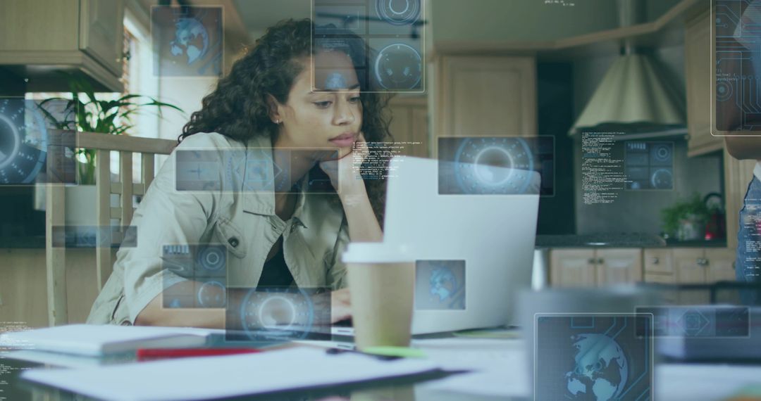 Woman Analyzing Data on Laptop in Contemporary Home Kitchen