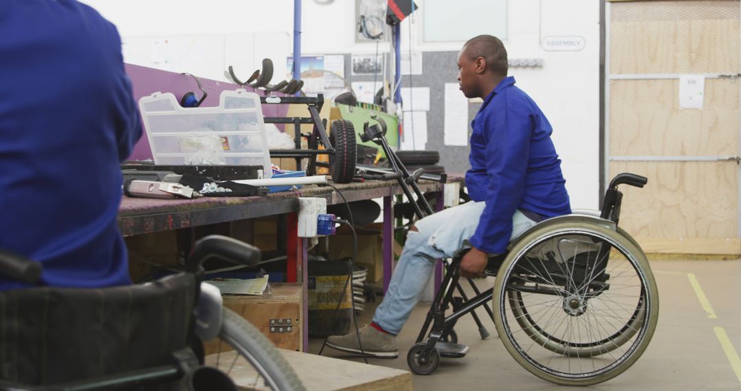 Disabled Worker in Workshop Attending to Workbench Tasks - Free Images, Stock Photos and Pictures on Pikwizard.com