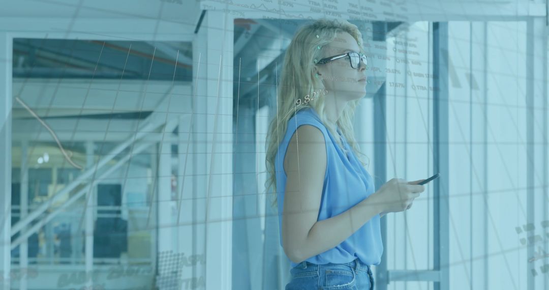 Professional Woman Analyzing Data in Modern Office Interior