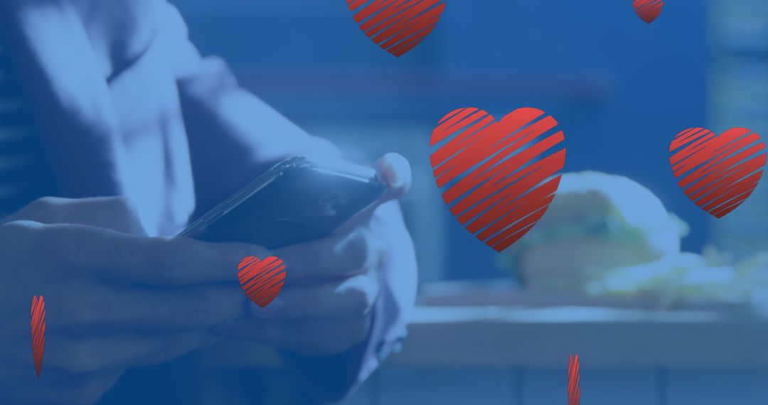 Person Texting on Smartphone with Red Heart Overlay in Cozy Cafe