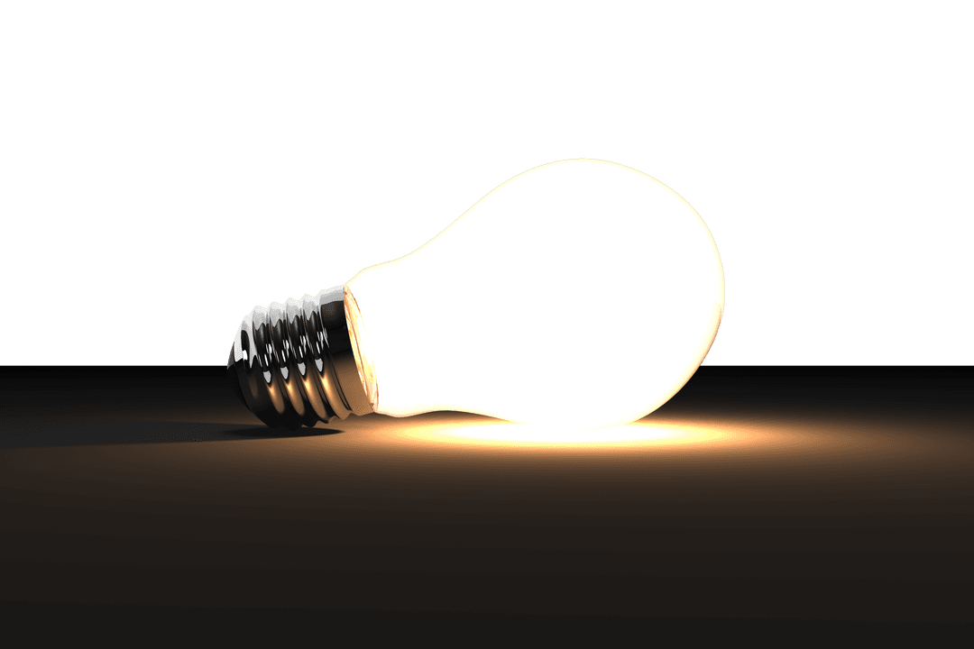 Illuminated Light Bulb on Transparent Background