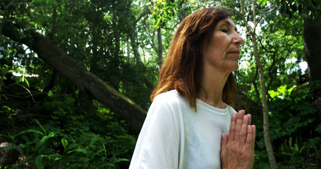 Mature Woman Practicing Mindfulness in Forest - Free Images, Stock Photos and Pictures on Pikwizard.com