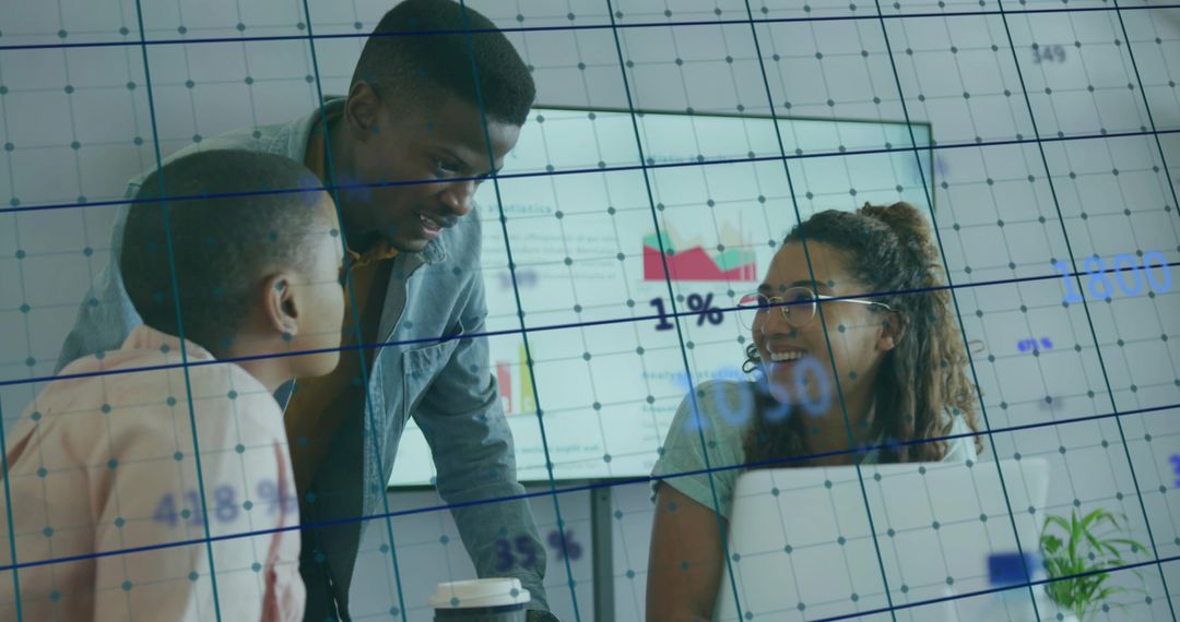 Colleagues Analyzing Business Data on Charts in Collaborative Meeting