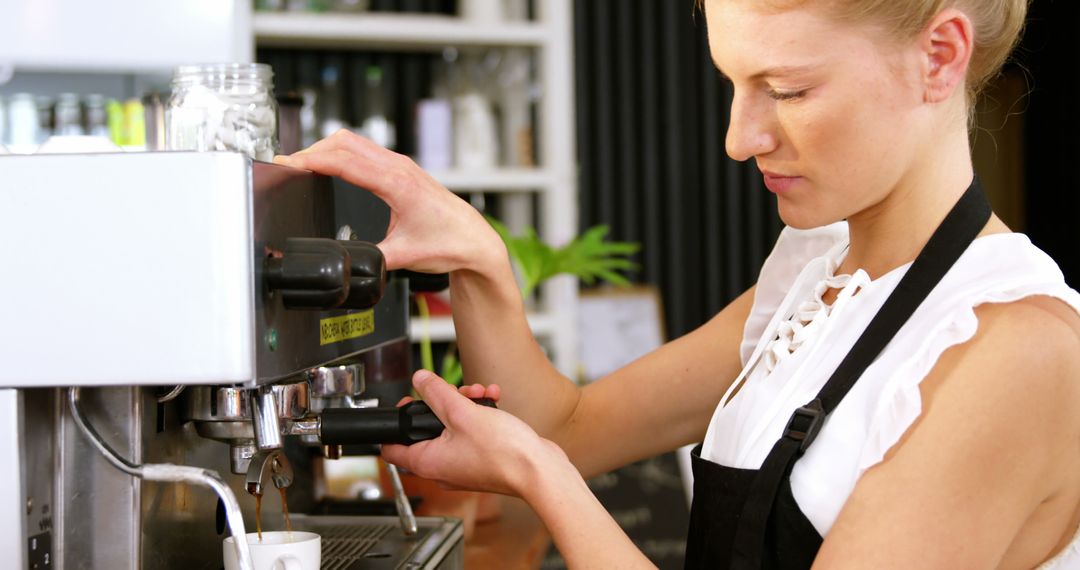 Female Barista Preparing Coffee in Modern Cafe - Free Images, Stock Photos and Pictures on Pikwizard.com