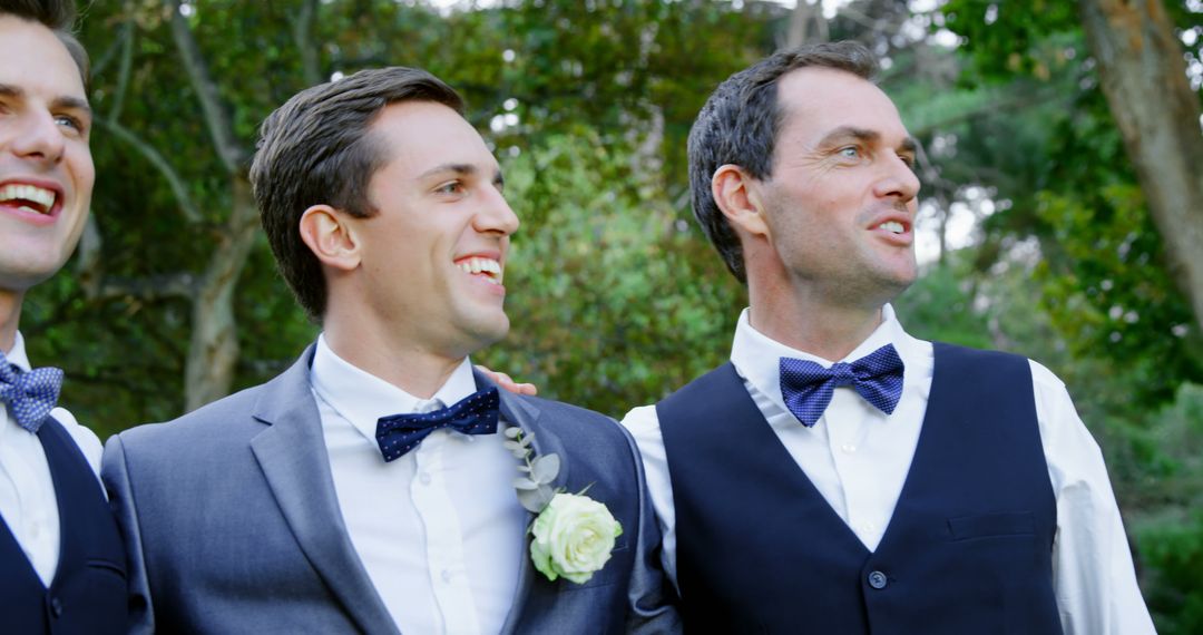 Groomsmen smiling together at outdoor wedding - Free Images, Stock Photos and Pictures on Pikwizard.com