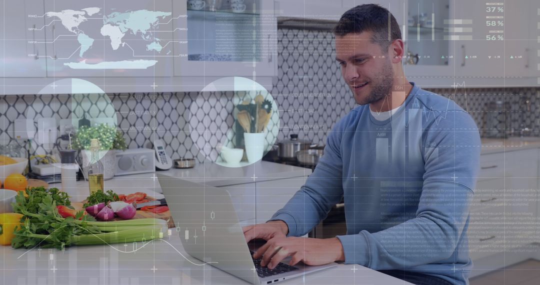 Man Working on Laptop in Kitchen with Virtual Interface Overlay - Free Images, Stock Photos and Pictures on Pikwizard.com