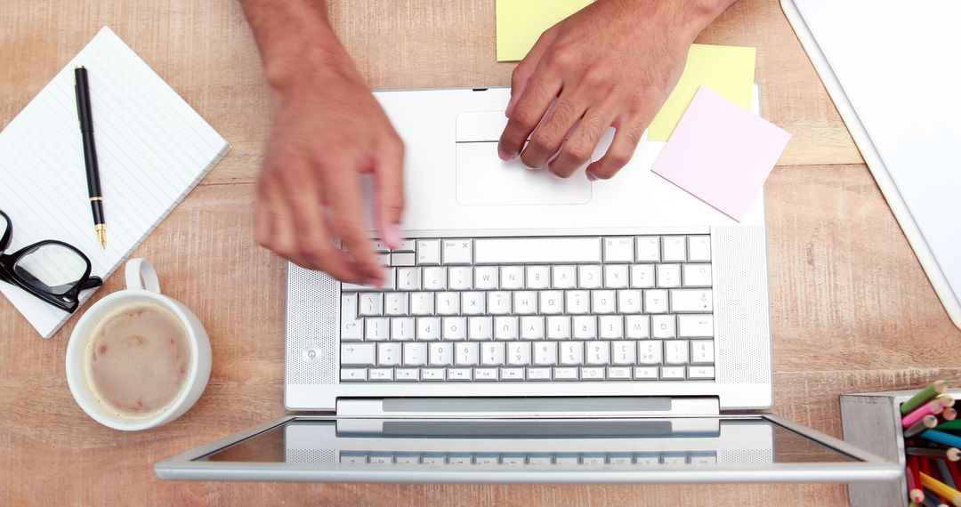 Productive Workspace with Laptop and Office Supplies