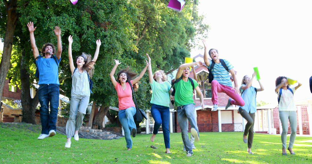 University students celebrating graduation by tossing caps outdoors - Free Images, Stock Photos and Pictures on Pikwizard.com