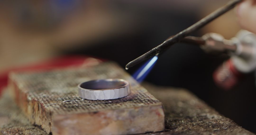 Silversmith Heating Ring with Torch in Workshop - Free Images, Stock Photos and Pictures on Pikwizard.com