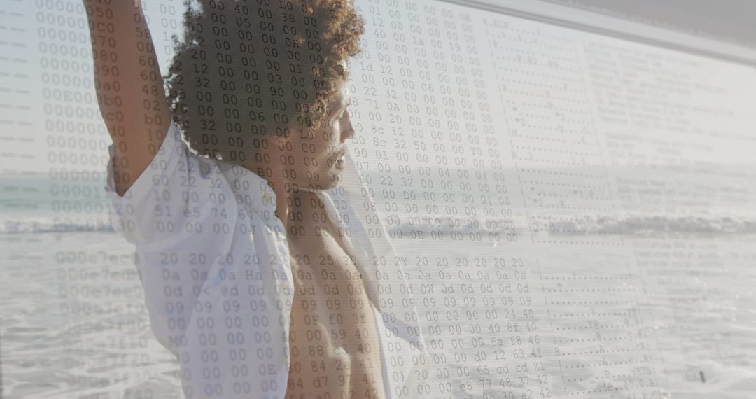 Man Stretching on Beach with Digital Binary Code Overlay