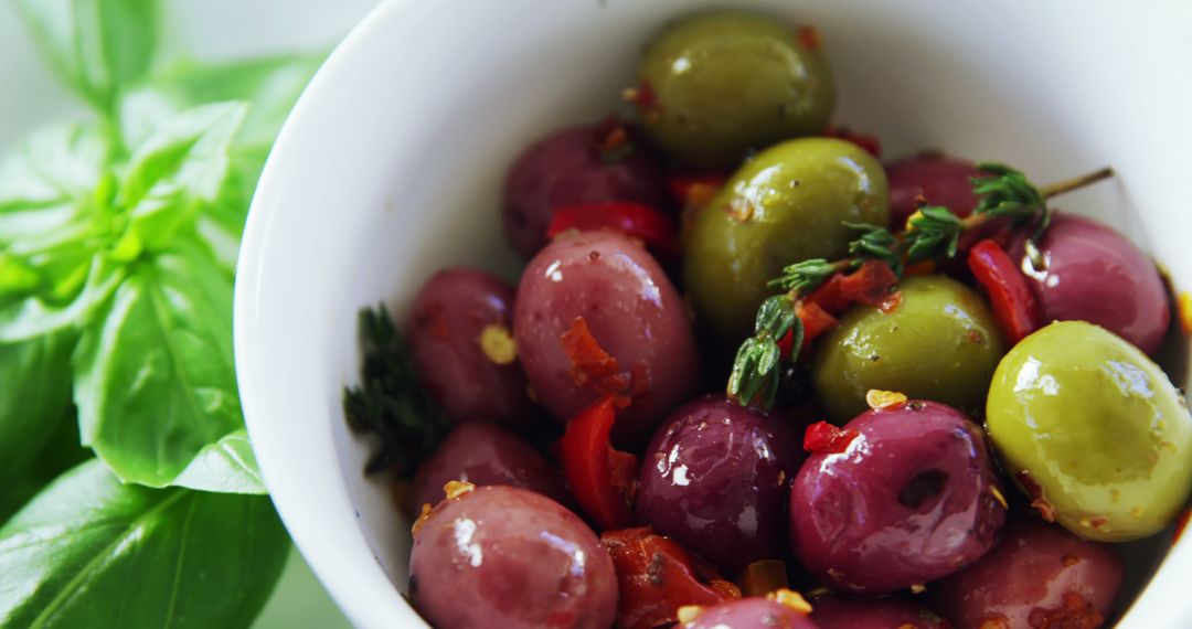 Bowl of Fresh Marinated Olives with Herbs and Peppers - Free Images, Stock Photos and Pictures on Pikwizard.com