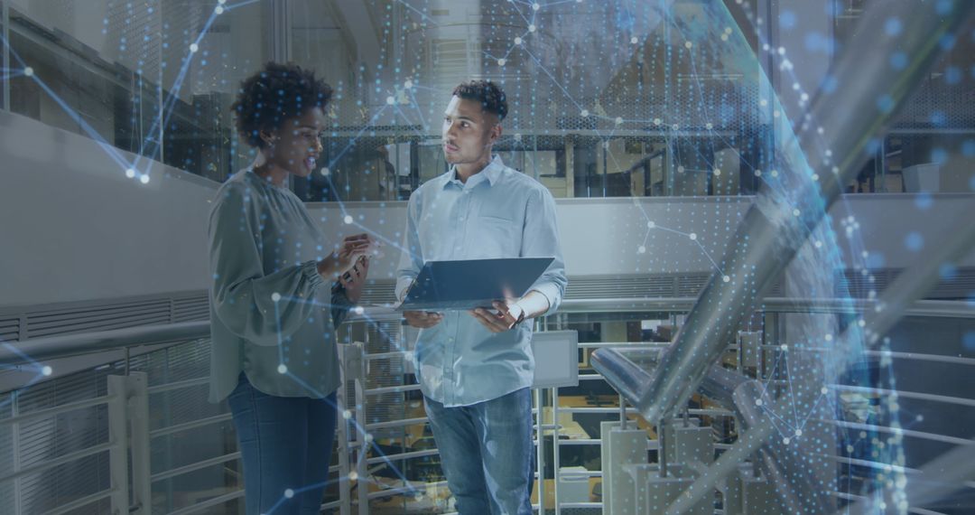 Diverse Business Professionals Engaged in Digital Data Analysis