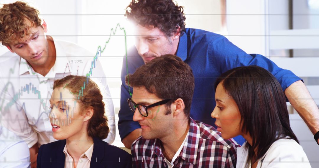 Diverse Team Analyzing Financial Data Together in Office