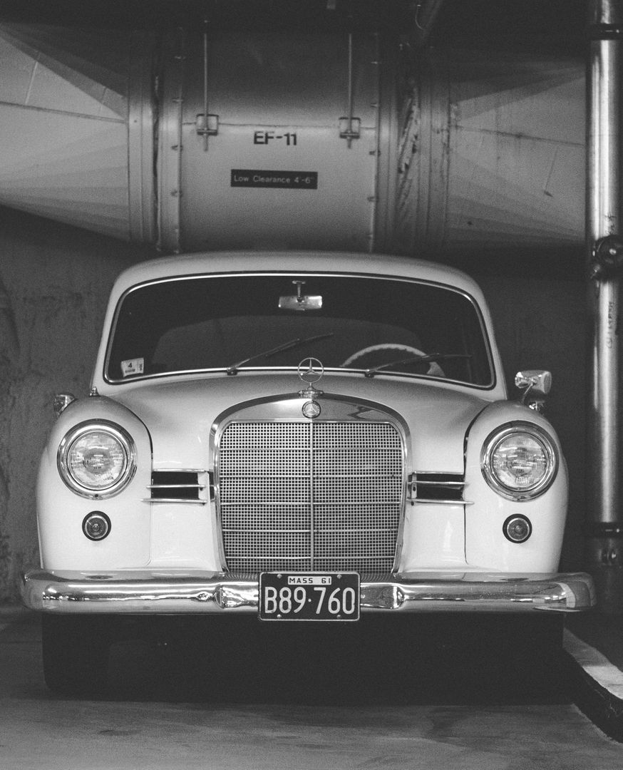 Vintage Classic Car In Urban Parking Garage - Free Images, Stock Photos and Pictures on Pikwizard.com