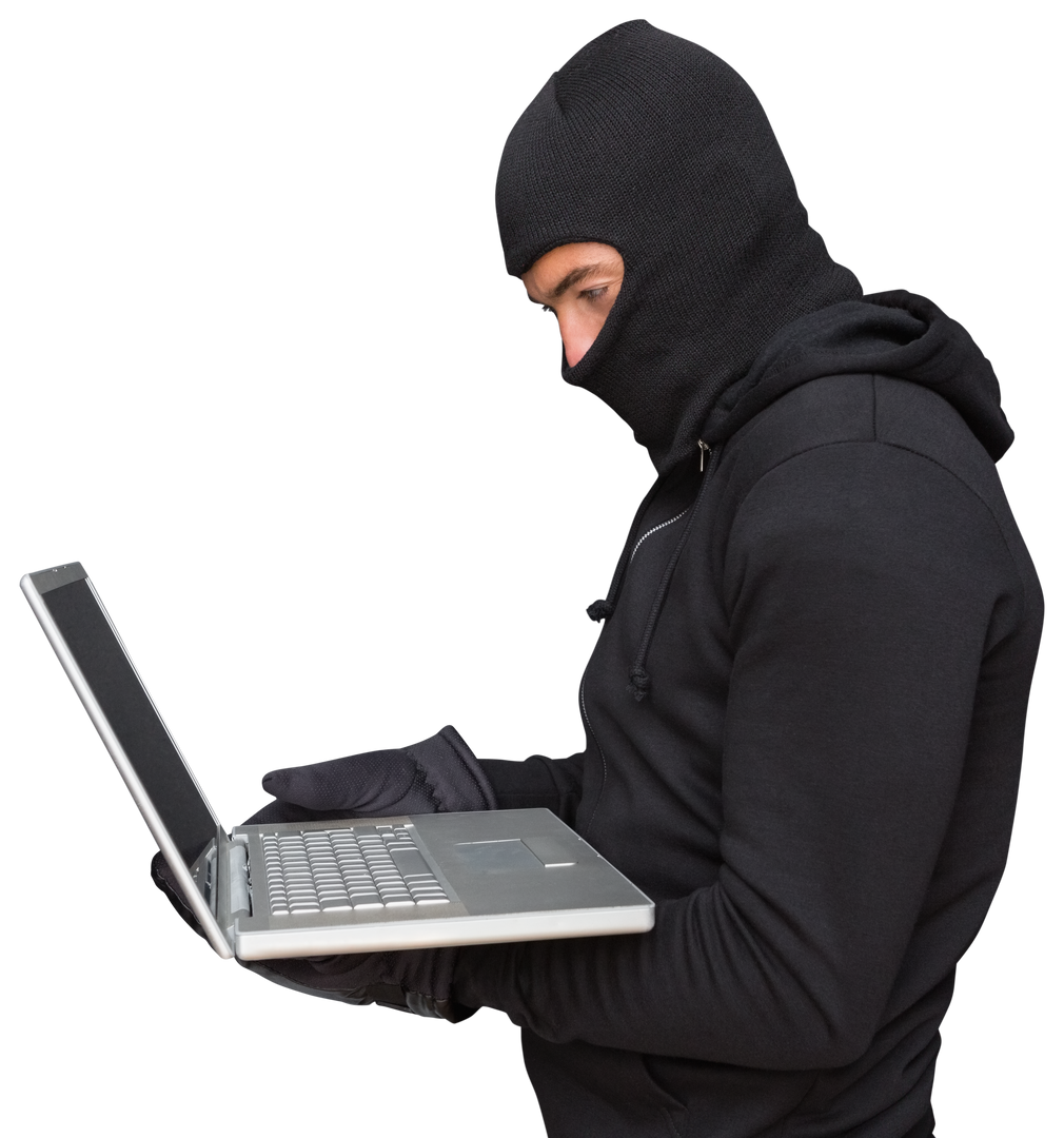 Transparent Side View of Masked Hacker Using Laptop To Commit Cybercrime - Download Free Stock Images Pikwizard.com