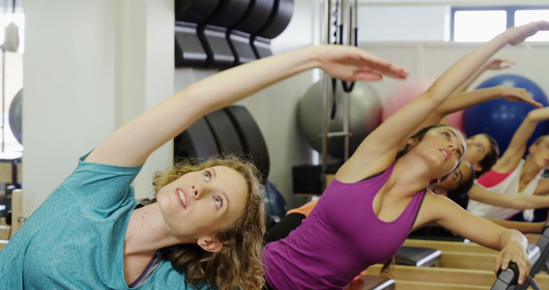 Women Doing Stretching Exercises in Fitness Class - Free Images, Stock Photos and Pictures on Pikwizard.com