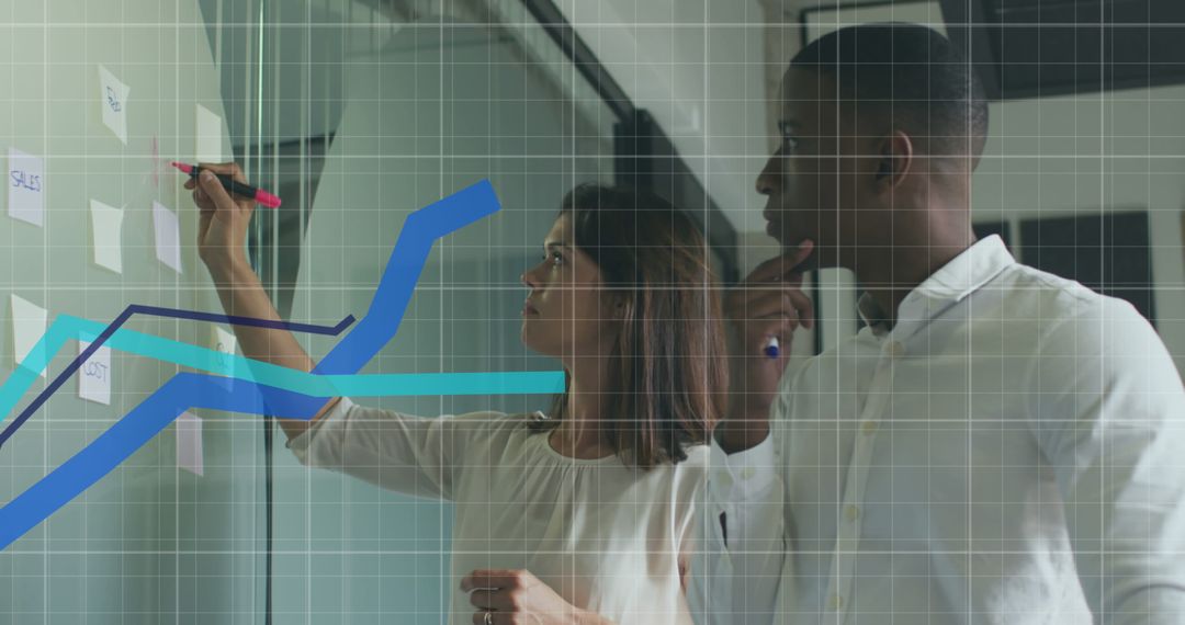 Business Team Analyzing Financial Growth Data in Modern Office