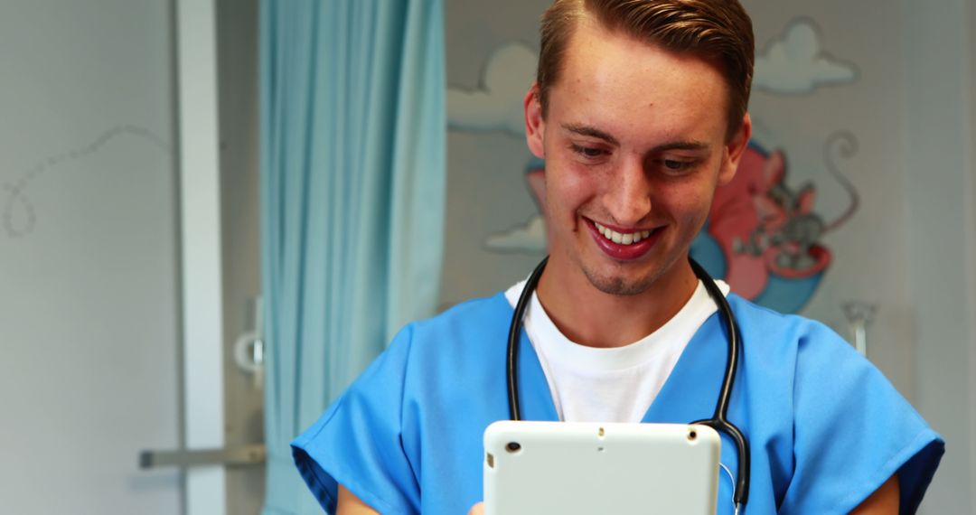 Young Nurse Using Tablet in Hospital - Free Images, Stock Photos and Pictures on Pikwizard.com