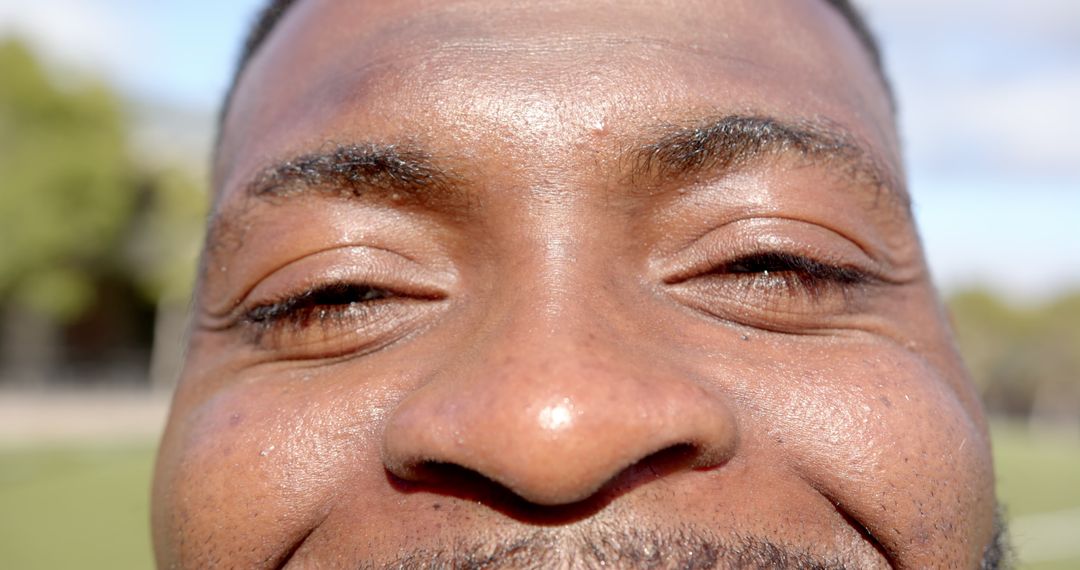 Close-Up of Smiling African American Man in Park