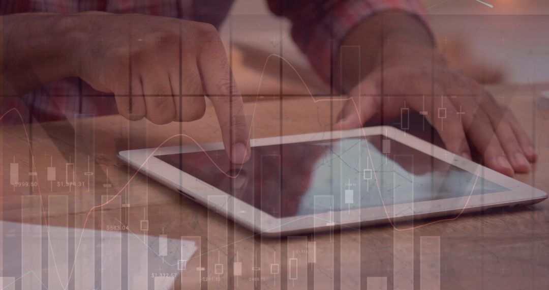 Business Professional Using Tablet with Financial Graph Overlay