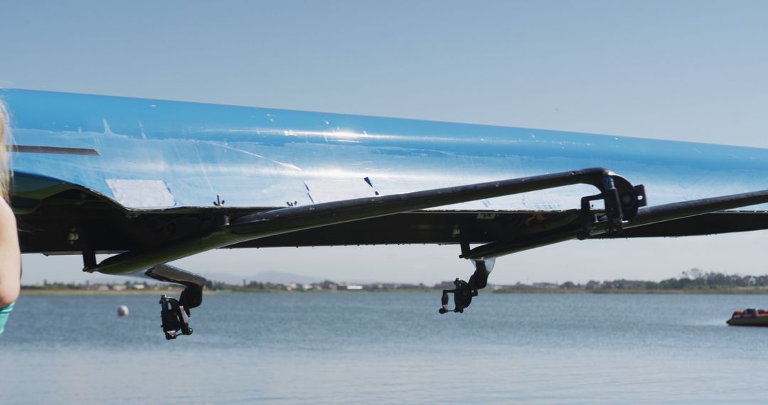 Bottom View of a Racing Shell Boat Near Calm Lake - Free Images, Stock Photos and Pictures on Pikwizard.com