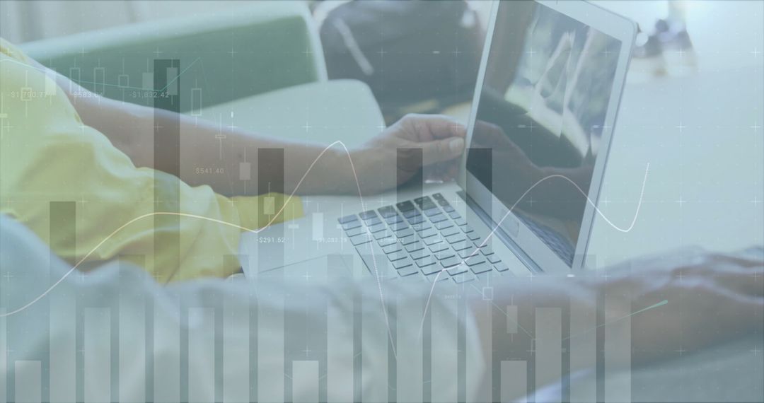 Caucasian Man Utilizing Laptop with Digital Data Overlay