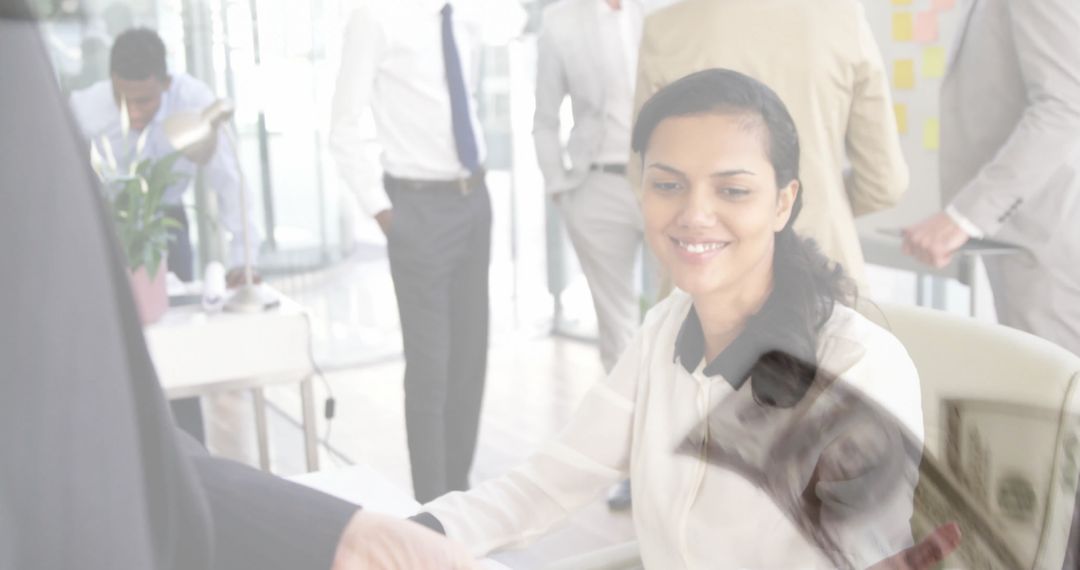 Confident Businesswoman Shaking Hands in Modern Office Setting