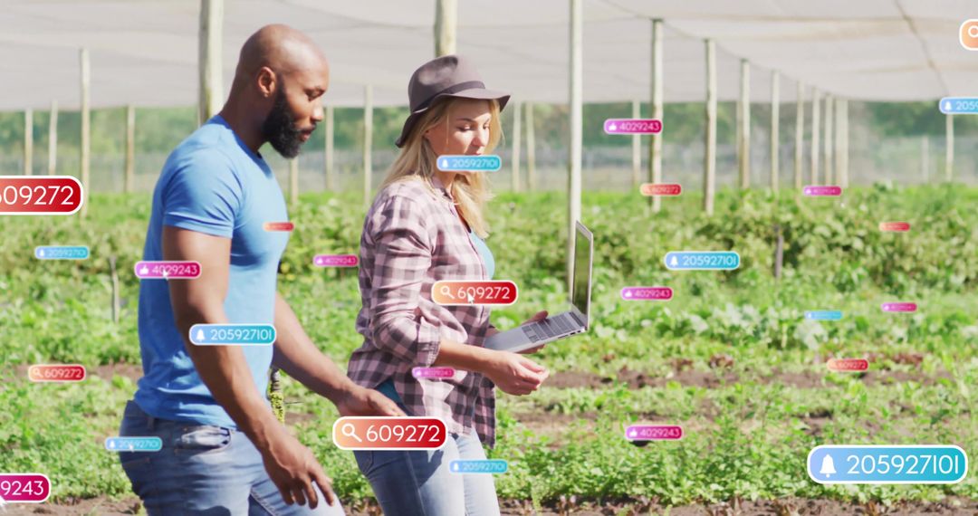 Researchers Analyzing Data in Modern Agricultural Field