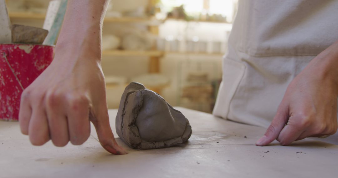 Hands Sculpting Pottery in a Creative Studio - Free Images, Stock Photos and Pictures on Pikwizard.com