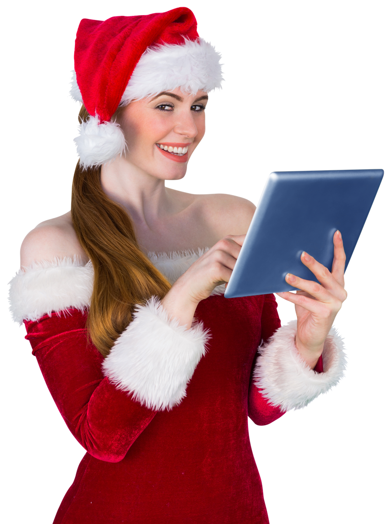 Santa girl in holiday costume using tablet against transparent background - Download Free Stock Images Pikwizard.com