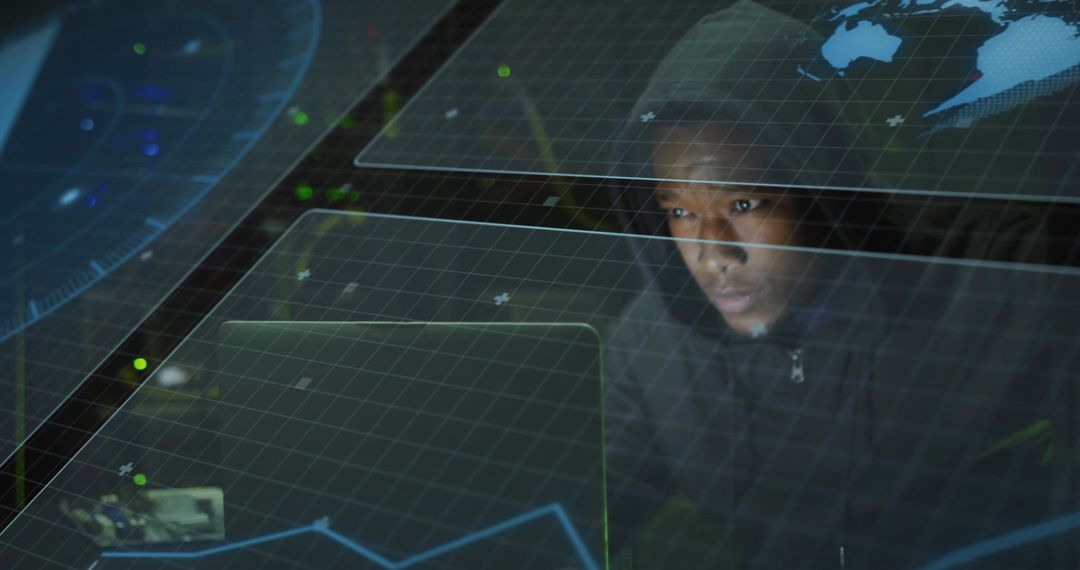 Man Analyzing Holographic Data on Laptop in Dark Environment