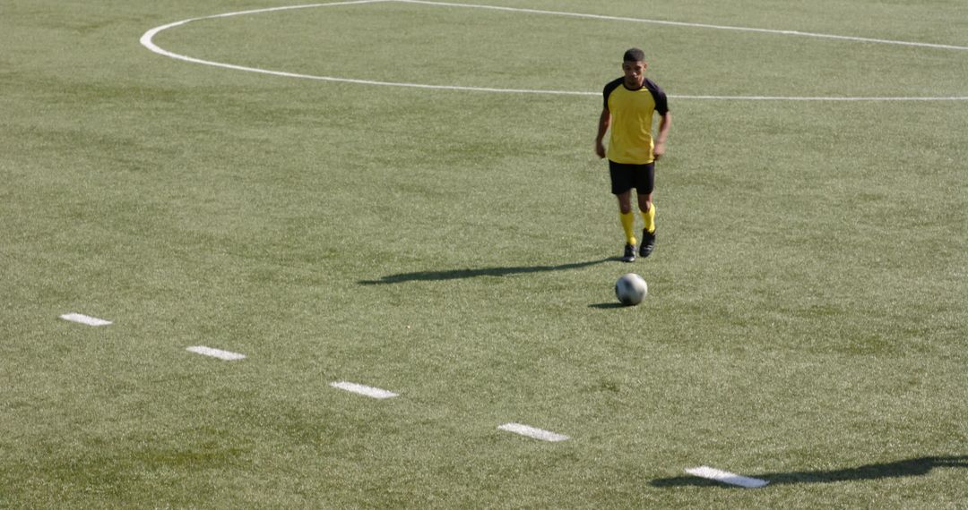 Young Soccer Player Engaging Intensely in Football Match