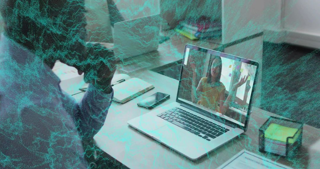 Colleague Discussing Problem over Online Video Call in Office Environment