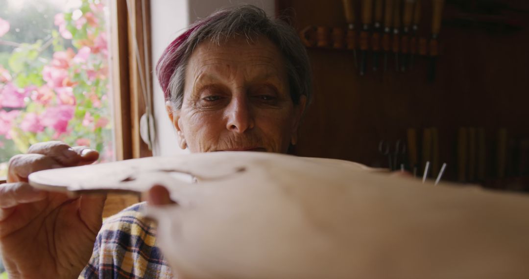 Female Craftsperson Focusing on Fine Woodwork in Studio - Free Images, Stock Photos and Pictures on Pikwizard.com